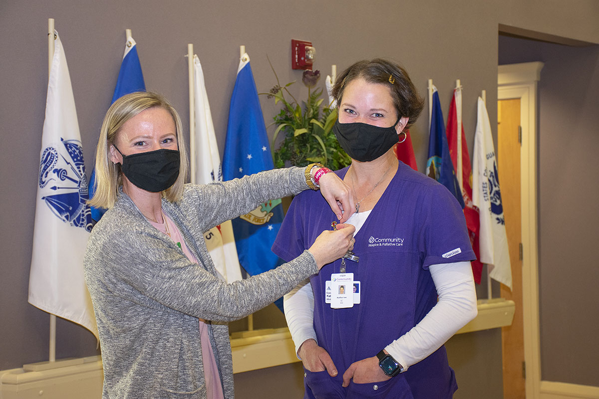 Community Hospice Nurse Katie Platt Receiving Her High Five Hero Pin of Recognition
